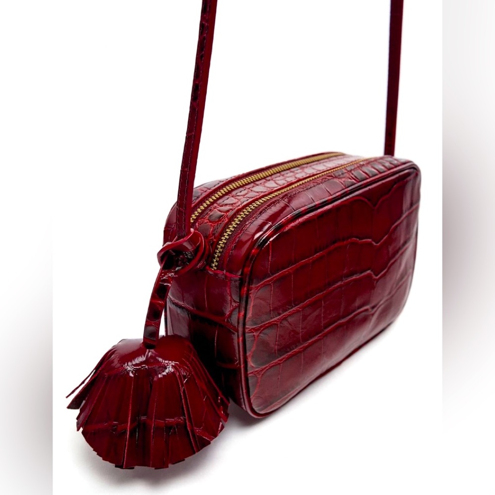 Leather bag with pompom (NWT)
New with tag